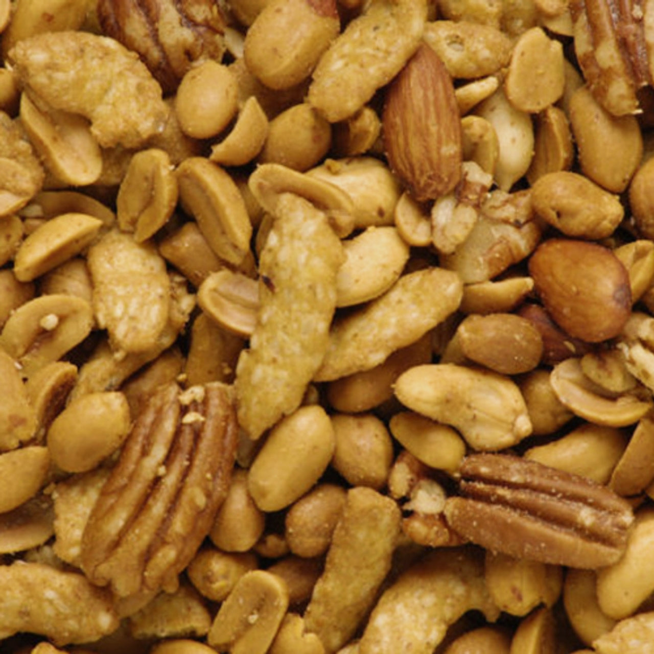 Assorted nuts including almonds, cashews, and pecans.