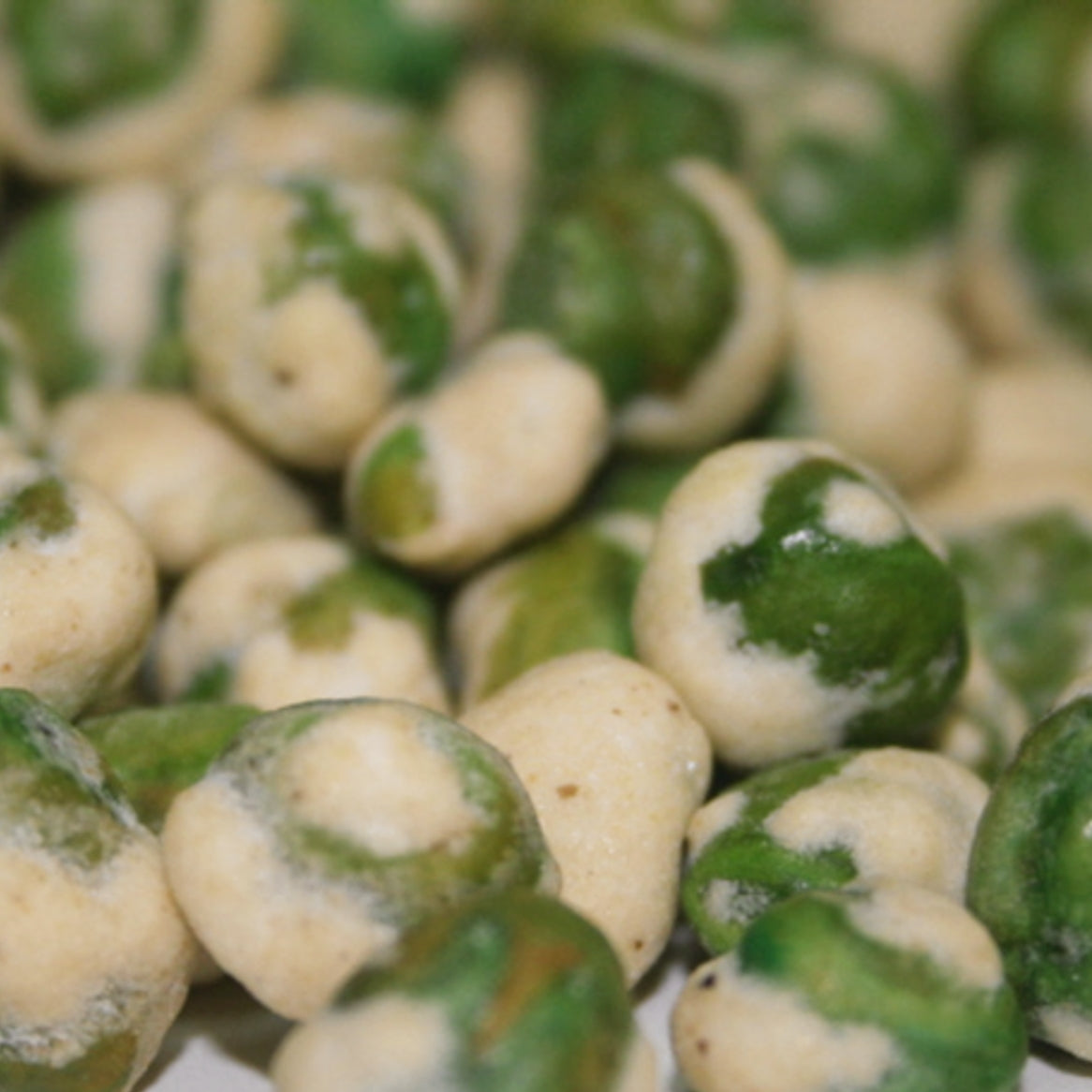 Close-up of green and white candy pieces