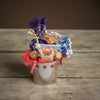 TNT Lone Star Gift Tin with praline pecans, snack mixes, and candies